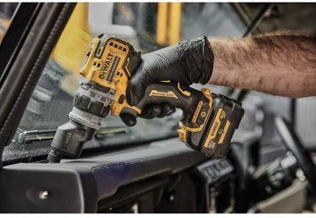 Дрель-шуруповерт аккумуляторная бесщеточная со сменными насадками DeWALT DCD703NT DCD703NT фото