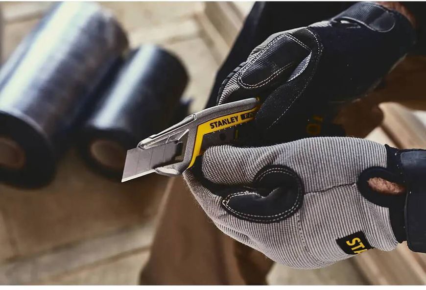 Ніж FatMax Integrated Snap Knife довжиною 165 мм з лезом шириною 18 мм з сегментами, що відламуються STANLEY FMHT10594-0 FMHT10594-0 фото