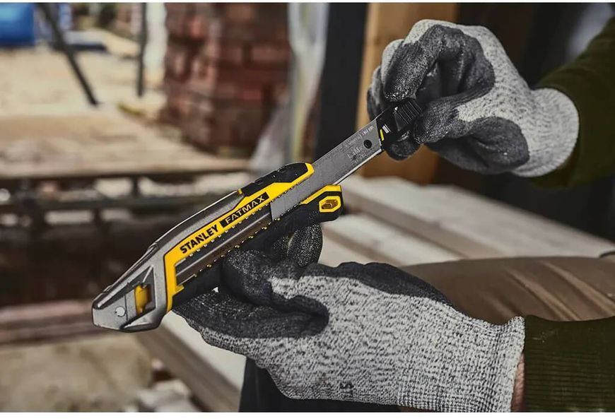 Ніж FatMax Integrated Snap Knife довжиною 165 мм з лезом шириною 18 мм з сегментами, що відламуються STANLEY FMHT10594-0 FMHT10594-0 фото