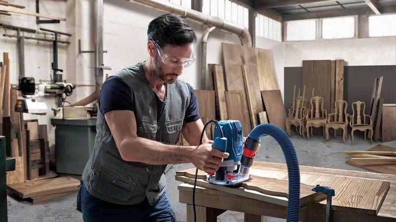 Фрезер Bosch GOF 130, 1300Вт, 11000-28000 об/хв, цанга 6 та 8мм, 3.5кг 0.601.6B7.000 фото